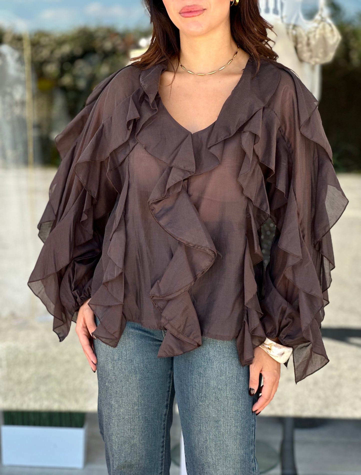 Blusa volant