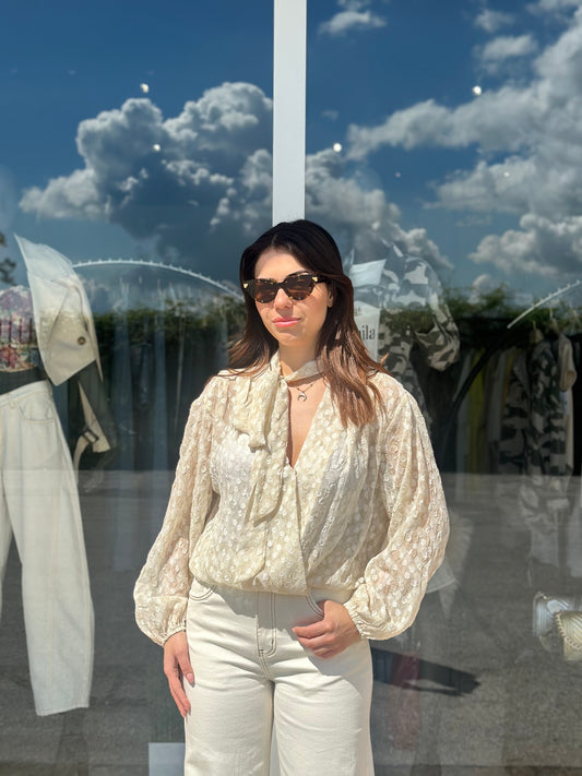 Blusa con fiocco