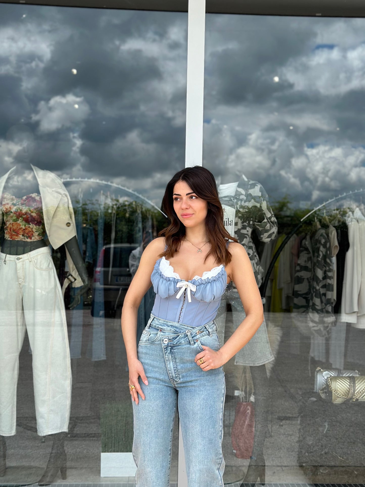 Jeans chiusura asimmetrica